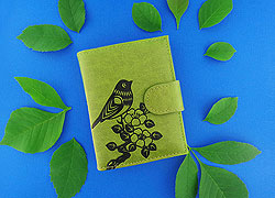 LAVISHY Akina collection wholesale fun vegan bird & flower embossed medium wallets to gift shop, clothing & fashion accessories boutique, book store in Canada, USA & worldwide since 2001.