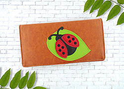 LAVISHY design & wholesale fun Eco-friendly vegan ladybug & leaf applique large wallets to gift shops, clothing & fashion accessories boutiques, book stores & specialty retailers