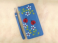 LAVISHY design & wholesale fun Eco-friendly vegan ladybug & flower applique wristlet wallets to gift shops, clothing & fashion accessories boutiques, book stores & specialty retailers