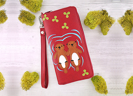 LAVISHY Adora collection wholesale sea otter lover holding hands applique vegan large wristlet wallets to gift shop, clothing & fashion accessories boutique, book store in Canada, USA & worldwide since 2001.