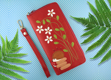 LAVISHY Adora collection wholesale hedgehog and flower applique vegan large wristlet wallets to gift shop, clothing & fashion accessories boutique, book store in Canada, USA & worldwide since 2001.