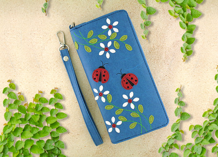 LAVISHY Adora collection wholesale ladybug and flower applique vegan large wristlet wallets to gift shop, clothing & fashion accessories boutique, book store in Canada, USA & worldwide since 2001.
