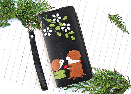 LAVISHY Adora collection wholesale kissing hedgehog lovers under flower tree applique vegan large wristlet wallets to gift shop, clothing & fashion accessories boutique, book store in Canada, USA & worldwide since 2001.