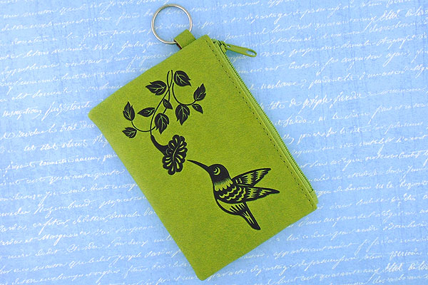 LAVISHY Akina collection wholesale fun vegan hummingbird & fuchsia flower embossed coin purses to gift shop, clothing & fashion accessories boutique, book store in Canada, USA & worldwide since 2001.