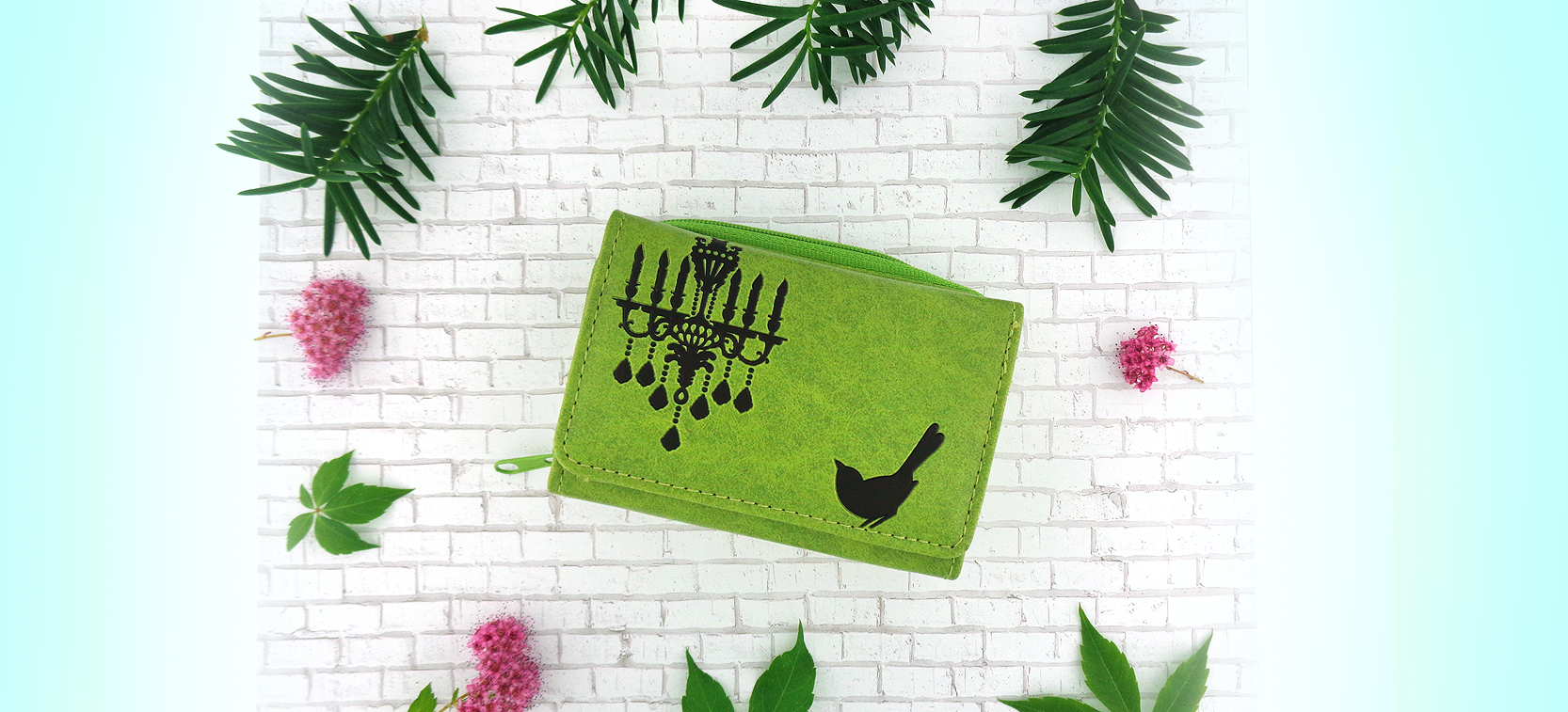 LAVISHY design and wholesale vegan embossed small wallets to gift shops, boutiques and book stores in Canada, USA and worldwide.