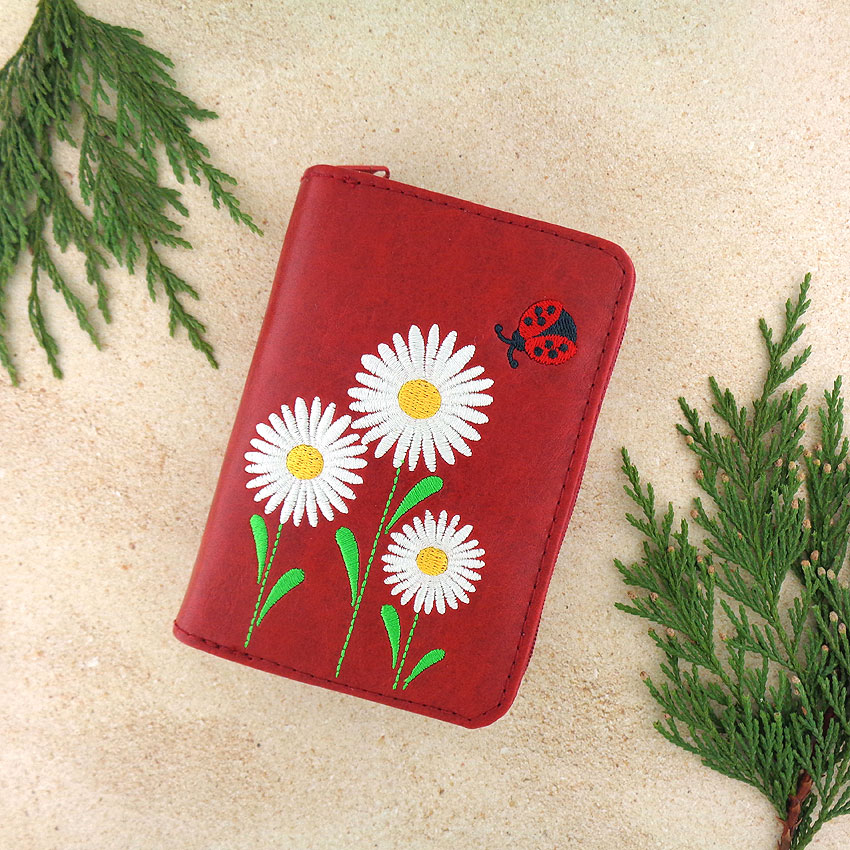 LAVISHY design & wholesale vegan embroidered cardholders to gift shops, clothing & fashion accessories boutiques, book stores and speciality retailers in Canada, USA and worldwide.