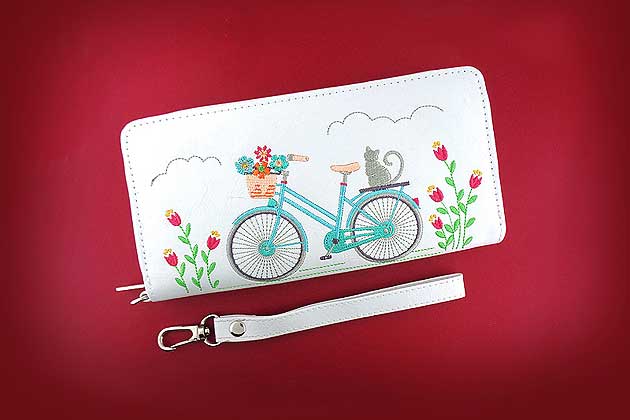 lavishy design & wholesale white color Cat On Bicycle Embroidered Vegan Wristlet Wallets