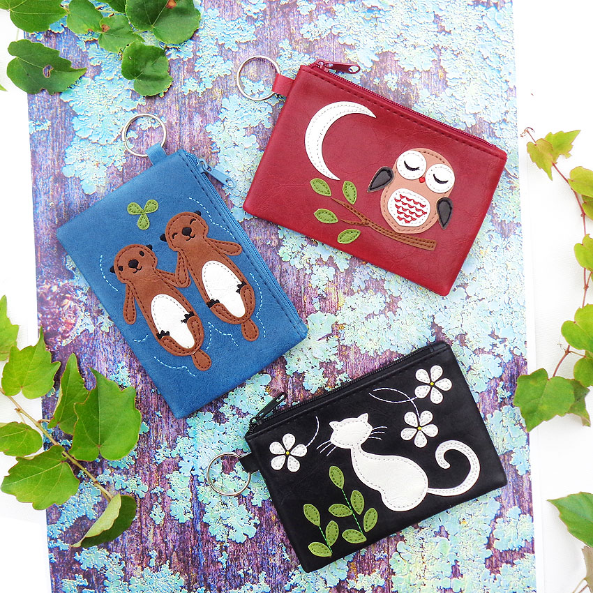 LAVISHY design & wholesale vegan applique coin purses to gift shops, clothing & fashion accessories boutiques, book stores and speciality retailers in Canada, USA and worldwide.