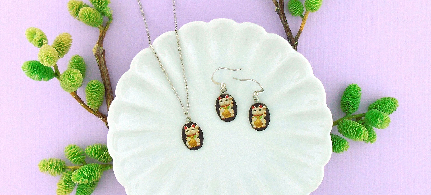 LAVISHY design and wholesale good luck/lucky maneki-neko money cat themed vegan accessories and gfits to gift shops, boutiques and book stores in Canada, USA and worldwide.