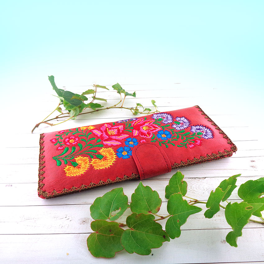 LAVISHY design & wholesale vegan embroidered large flat wallets to gift shops, clothing & fashion accessories boutiques, book stores and speciality retailers in Canada, USA and worldwide.