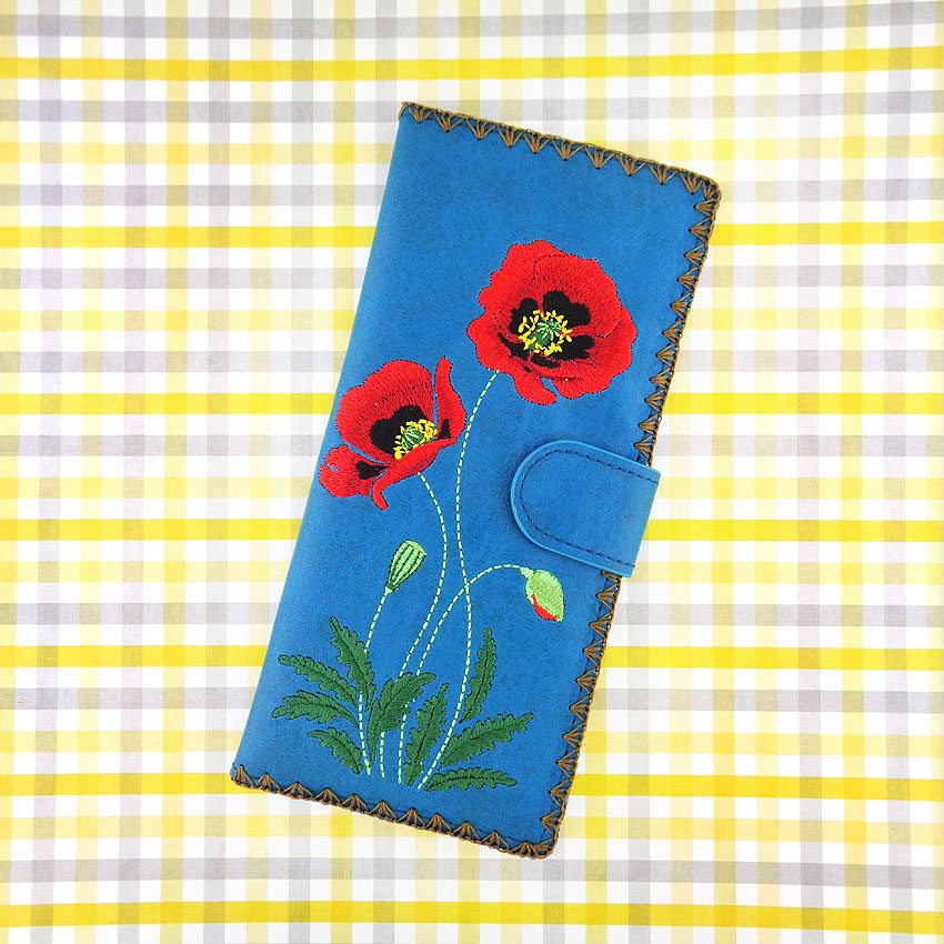 LAVISHY design & wholesale vegan embroidered large flat wallets to gift shops, clothing & fashion accessories boutiques, book stores and speciality retailers in Canada, USA and worldwide.
