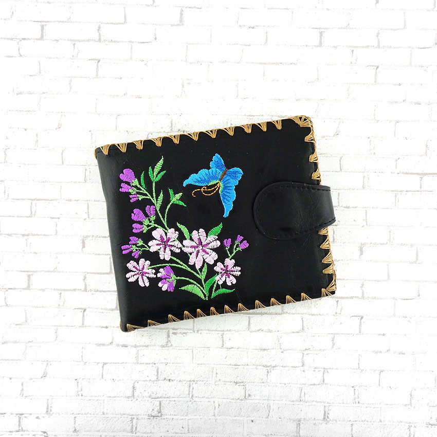 LAVISHY design & wholesale vegan embroidered flat medium wallets to gift shops, clothing & fashion accessories boutiques, book stores and speciality retailers in Canada, USA and worldwide.