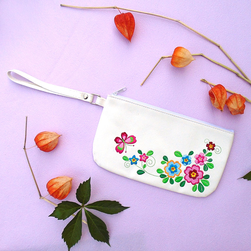 LAVISHY design & wholesale vegan embroidered wristlets to gift shops, clothing & fashion accessories boutiques, book stores and speciality retailers in Canada, USA and worldwide.